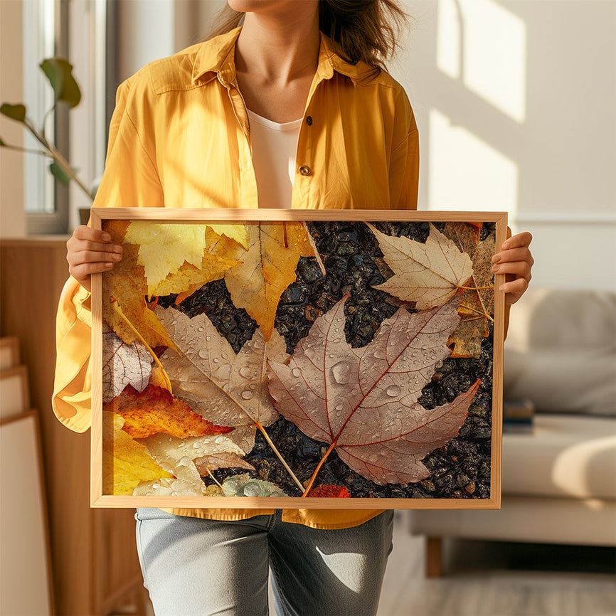 women standing in bright living room and holding framed autumn leaves horizontal print