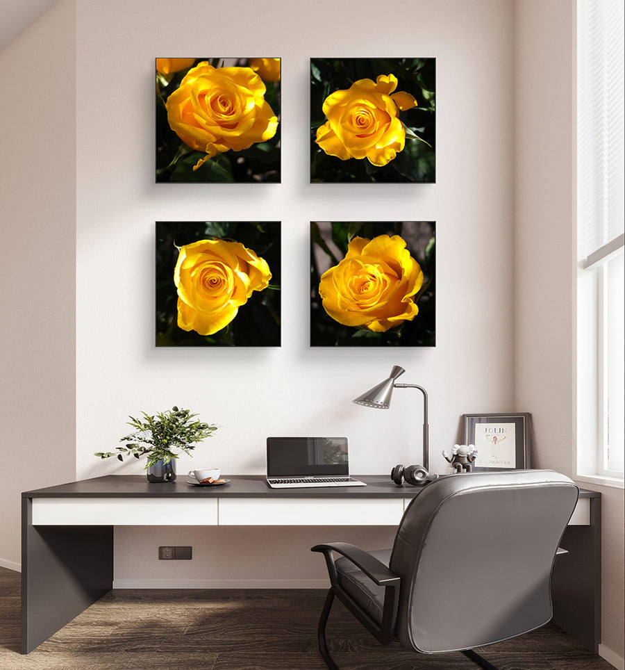 Modern office setup with a desk, chair, and wall art of yellow roses in sunlit square prints.